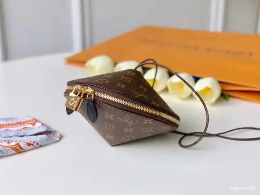 TOUPIE VUITTON LOUIS 0324